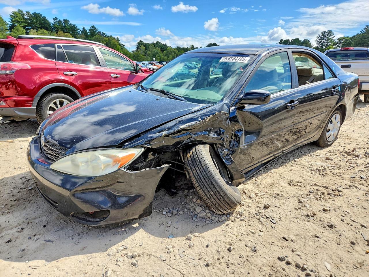 Photo of the 2004 TOYOTA CAMRY LE