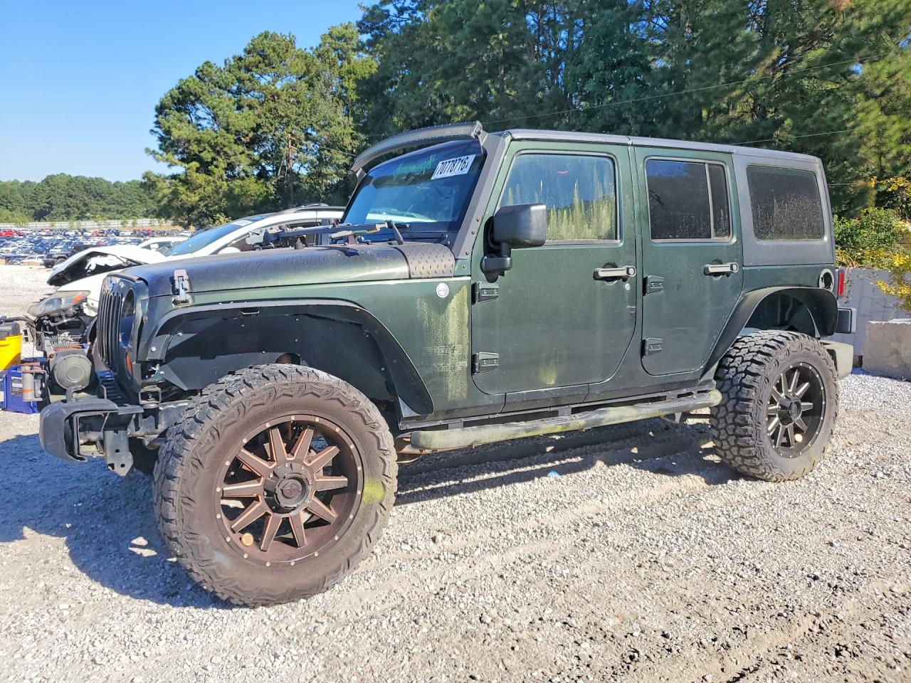 Photo of the 2011 JEEP WRANGLER UNLIMITED SPORT